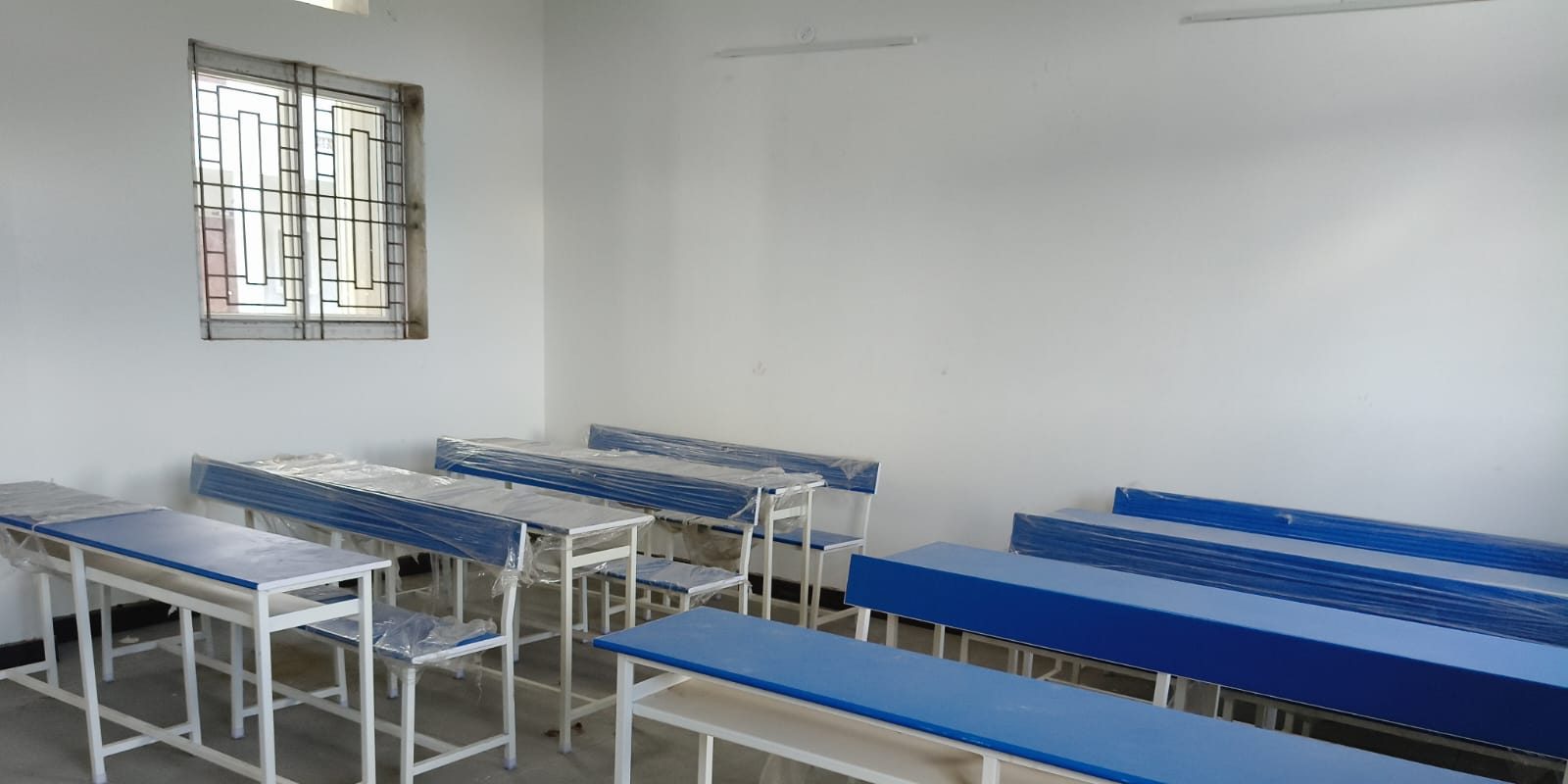 Classroom with new blue and white student benches